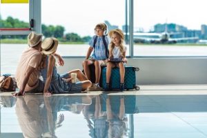 Family sitting in an airport