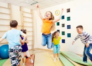 Kids playing and jumping around