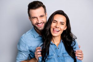 Couple smiling cheerfully