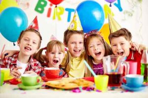 Kids celebrating friend's birthday