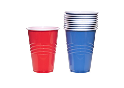 Blue party cups stacked next to a red cup