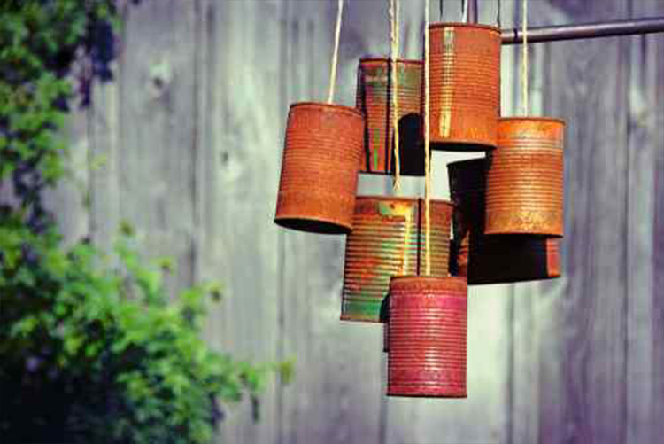 Picture of tin-can wind chimes hanging outdoors