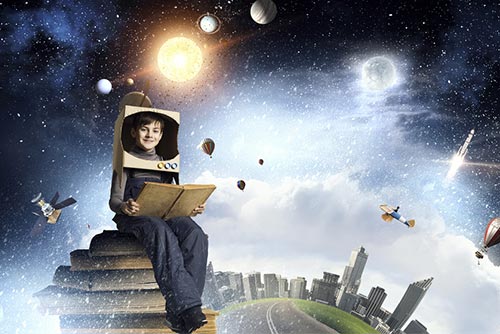 A boy reading a book with an imaginary backdrop of the sky and space.