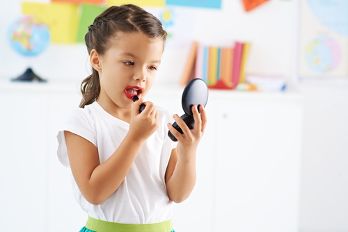 Little girl wearing makeup