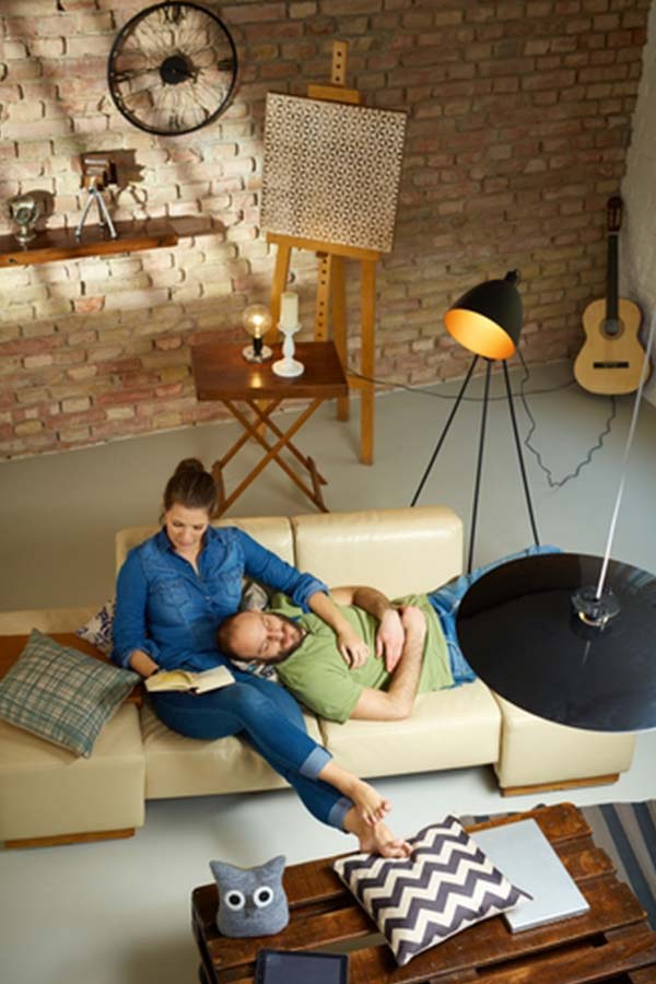 Couple relaxing in the living room