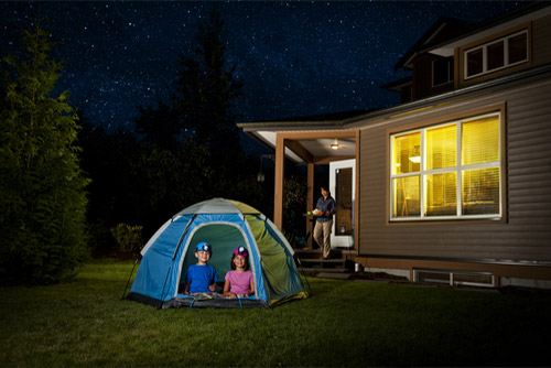 Kids camped in the backyard.