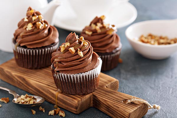 Chocolate and almond cupcakes served on a wooden tray!