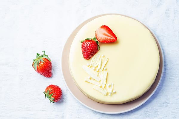 White chocolate cheesecake served with strawberries!