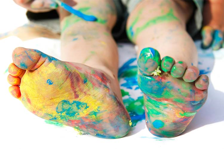 Kids’ feet painted with watercolours!