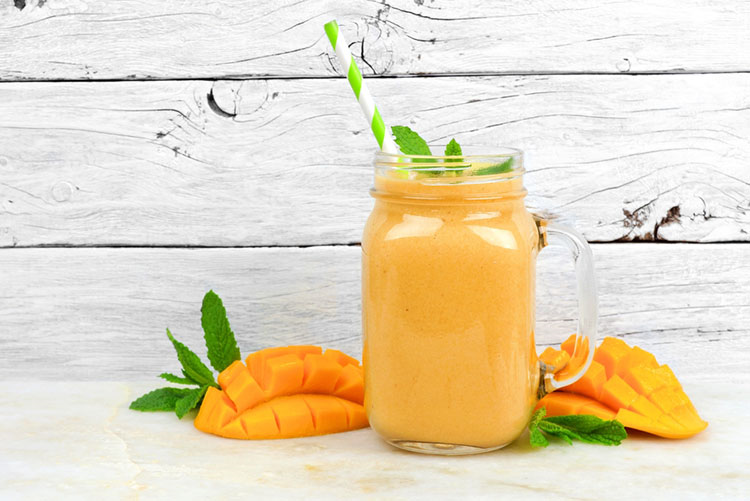 Mango smoothie served in a mason jar!