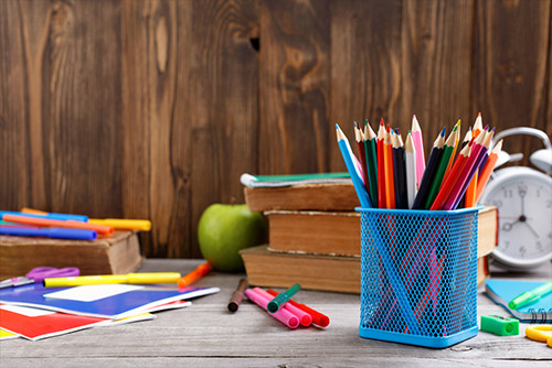Stationary holder stuffed with coloured pencils