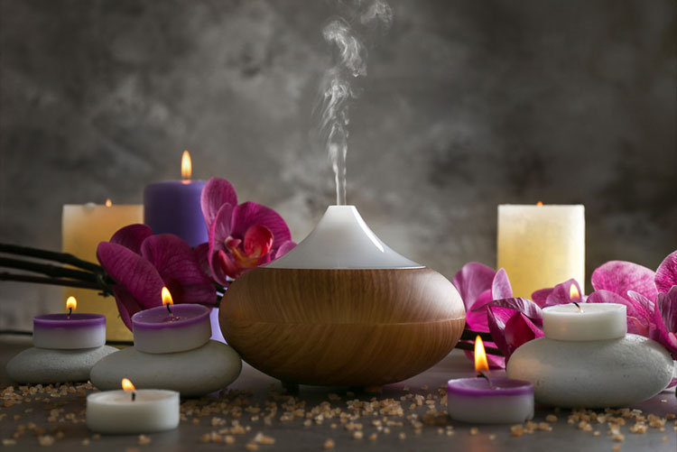 An aroma oil diffuser with candles