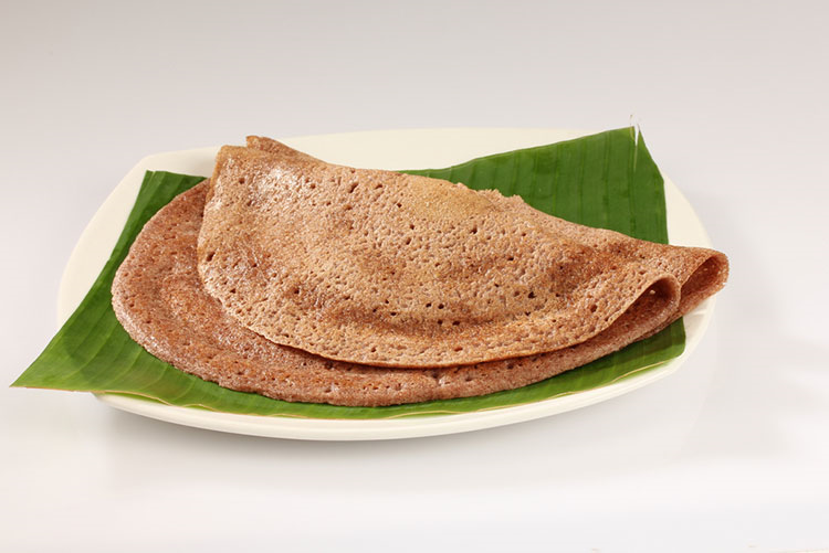 Ragi dosa on white plate