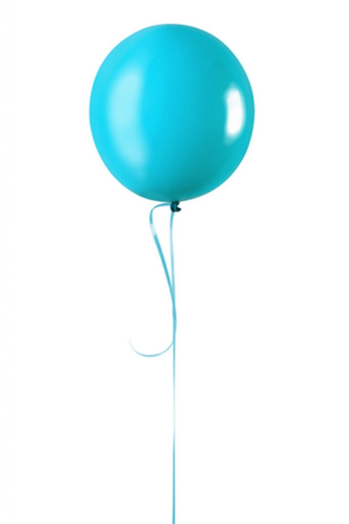 A single blue balloon suspended in the air