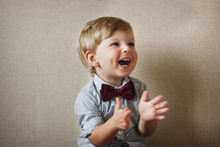 A bow wearing a solid-colour bow tie.