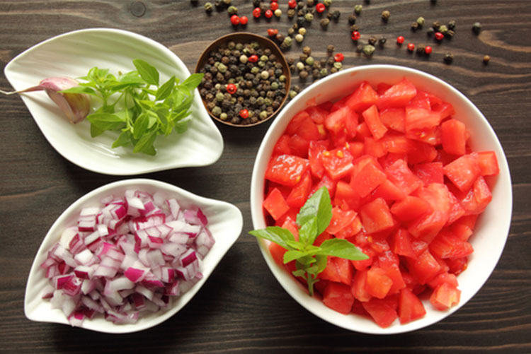 Chopped tomatoes, onions, basil, and pepper