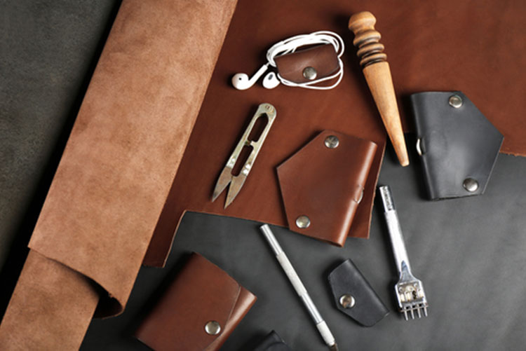 A leather sheet and wallet making tools