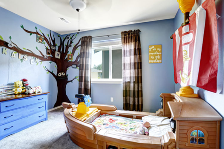 A boat-shaped bed in a kid's room