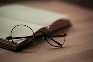 Harry Potter spectacles placed on a book!