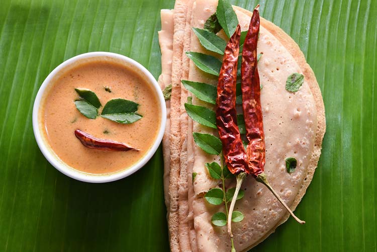 Whole wheat dosa served with peanut chutney!