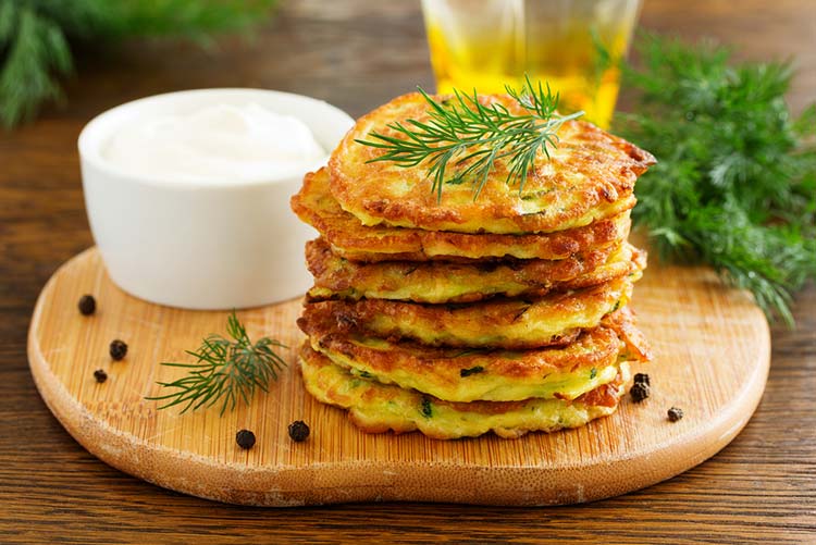 Vegetable pancakes served on a wooden plate!