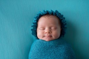 Baby sleeping on the bed