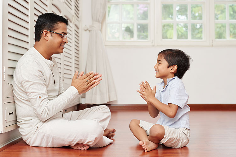 A father having a patient conversation with his son.