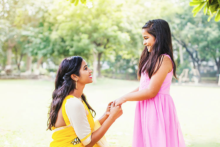 A mother having a pleasant conversation with her child.