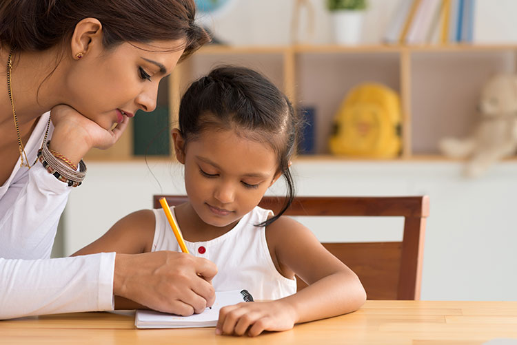 A mom teaching her child.