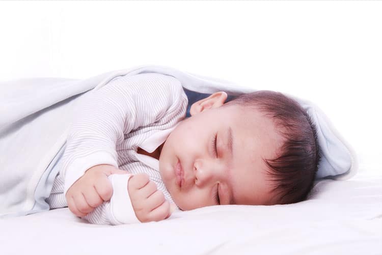 A newborn in deep sleep.