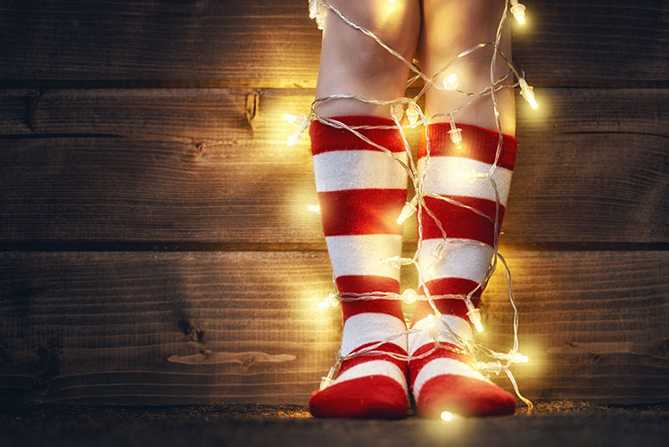 Young child wearing Christmas socks