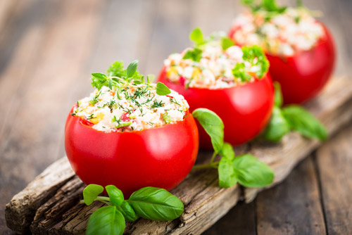 Tomatoes stuffed with cheese and basil