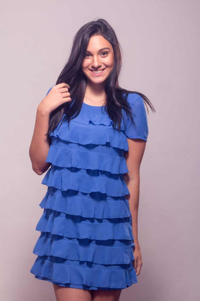 Woman in a Classic Blue frill dress!