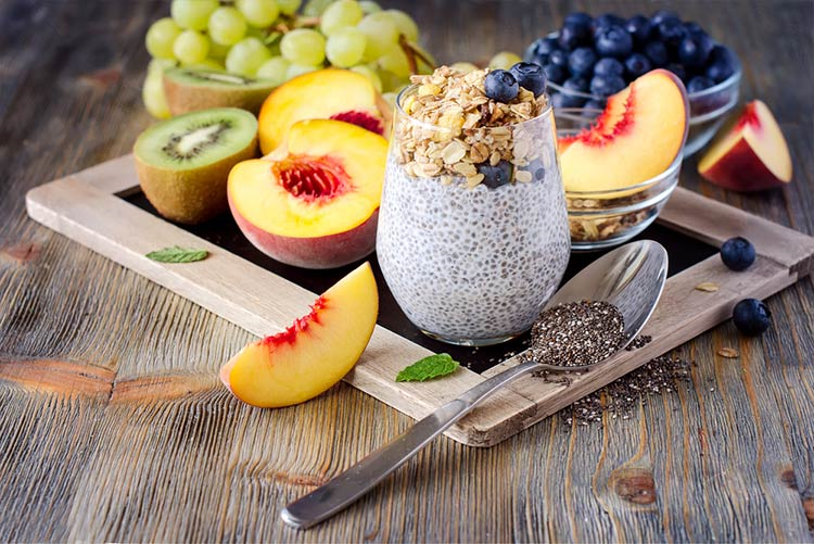 Oatmeal and chia seeds smoothie served with grapes and berries