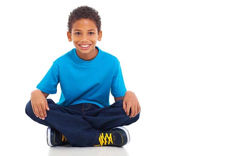 A young boy smiling at the cam.