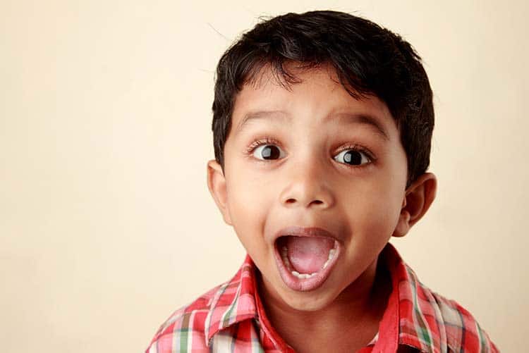 A boy staring with his mouth wide open.