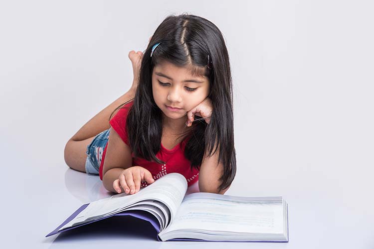 A girl reading a book.