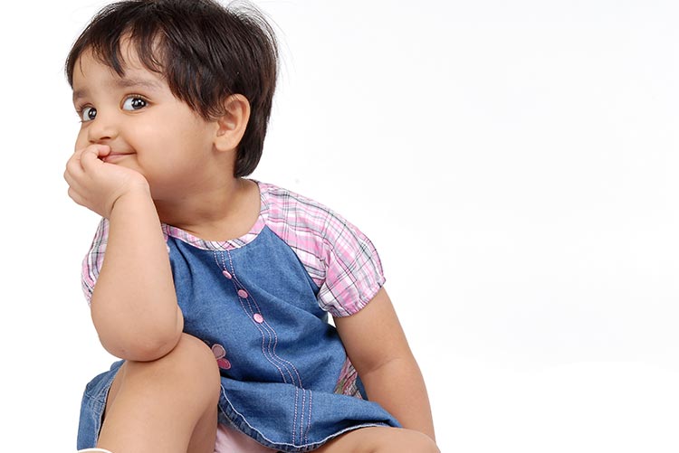 A girl happy about her Hindu baby girl name.