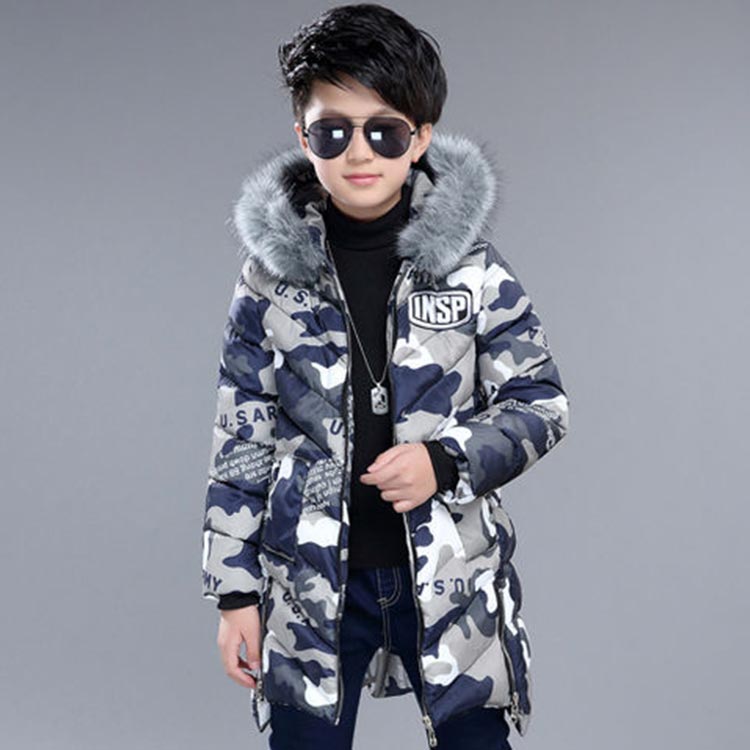 Young boy wearing a Blue Full Sleeves Camouflage Print Hooded Coat and Black sunglasses.