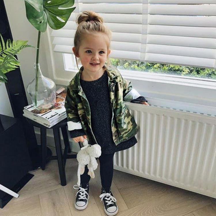 Little girl wearing a Green Camouflage Print Waistcoat