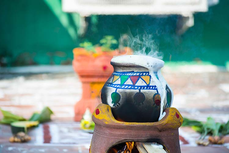 A pot of rice and milk being cooked.