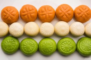 Indian sweet (peda) laid out like the Indian national flag in the colours - saffron, white, and green!