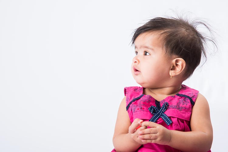 Side portrait of an adorable young girl!