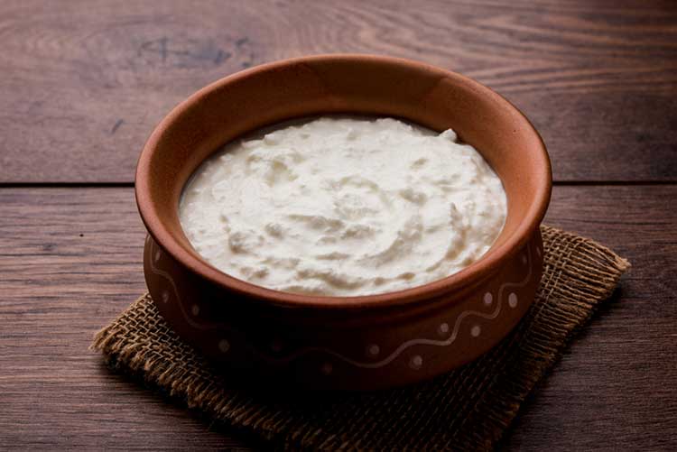  Plain curd or yoghurt in a Handi.