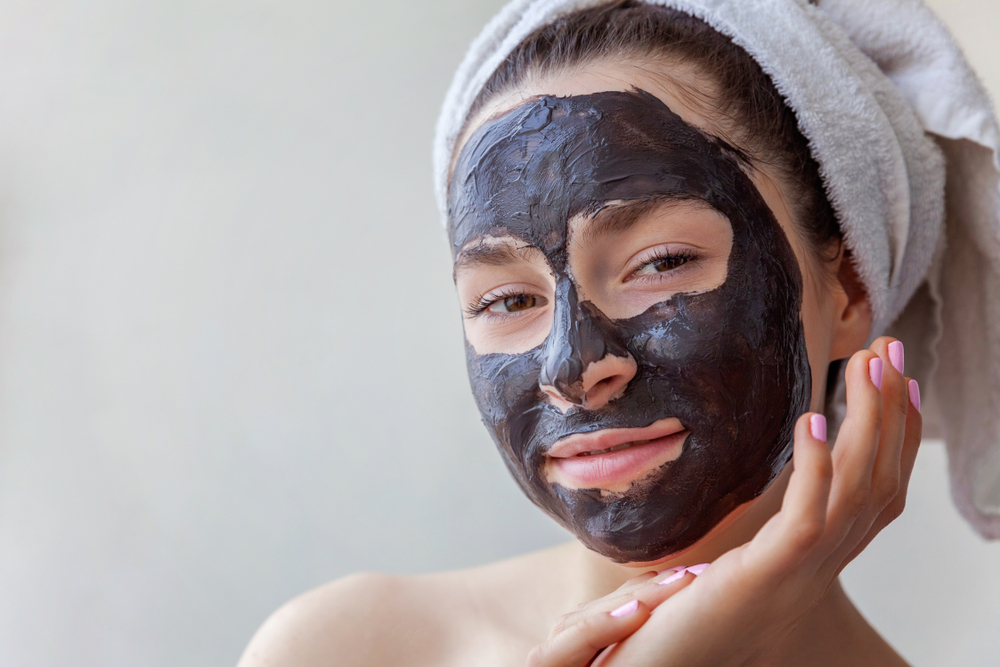 Woman wearing a peel-off face mask